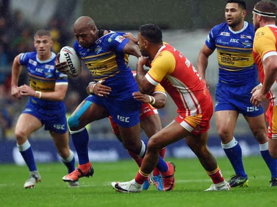 Rob Lui takes on Catalans Dragons' defence during last year's clash at Emerald Headingley. Picture by Andrew Varley.