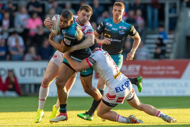 Kallum Watkins, playing in the second-row, is tackled during his final appearance for Rhinos, a 36-10 defeat at St Helens on June 21 last year. Picture by Bruce Rollinson.