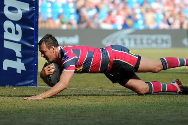 Danny McGuire scores his fourth try of the match against Bradford Bulls at Magic Weekend in 2012. Picture: PA.
