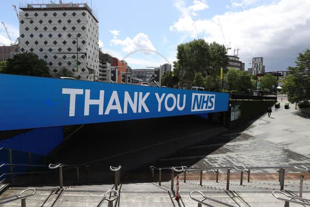 FIGHTING BACK: A thank you NHS sign at a deserted Wembley Park tube station close to Wembley stadium on what should have been FA Cup final day on Saturday. Photo by Catherine Ivill/Getty Images.