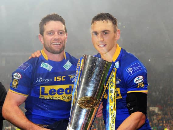 Danny Buderus, left and Kevin Sinfield with the Super League trophy at Old Trafford in 2011. Picture by Steve Riding.