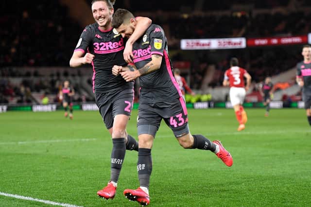 LEADING THE WAY: Leeds United sit top of the suspended Championship campaign after eight draws and 21 victories including the triumph at Middlesbrough, above, as Luke Ayling and Mateusz Klich celebrate Klich's goal. Photo by George Wood/Getty Images.
