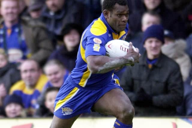 Marcus Bai scoring one of his hat-trick of tries on debut for Rhinos against London Broncos in 2004. Picture by Steve Riding.