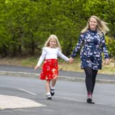 Molly Beelby, five, with mum Claire. Molly has just finished walking 56km in ten days for the Trussell Trust, which supports food banks. Picture: Tony Johnson