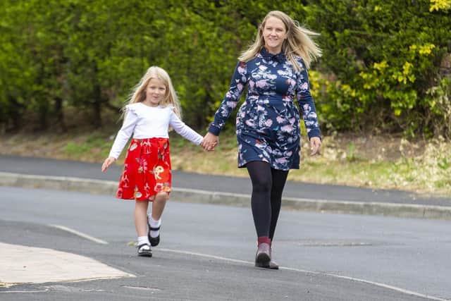 Molly Beelby, five, with mum Claire. Molly has just finished walking 56km in ten days for the Trussell Trust, which supports food banks. Picture: Tony Johnson