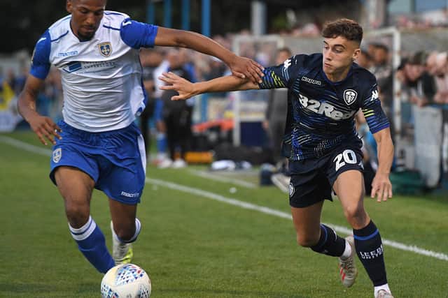 UNDER THE RADAR: Niall Huggins, right, in action for Leeds United during last summer's pre-season friendly against Guiseley.