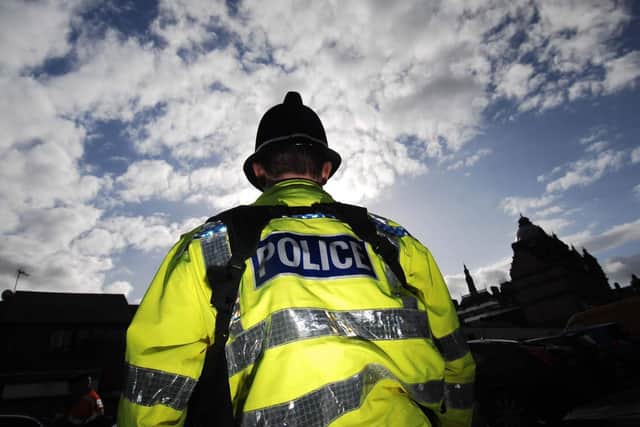 Police have ordered residents in Huddersfield to close their windows and doors