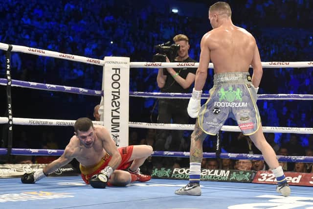 Josh Warrington puts down Sofiane Takoucht for the second time at Leeds Arena. Picture: Steve Riding