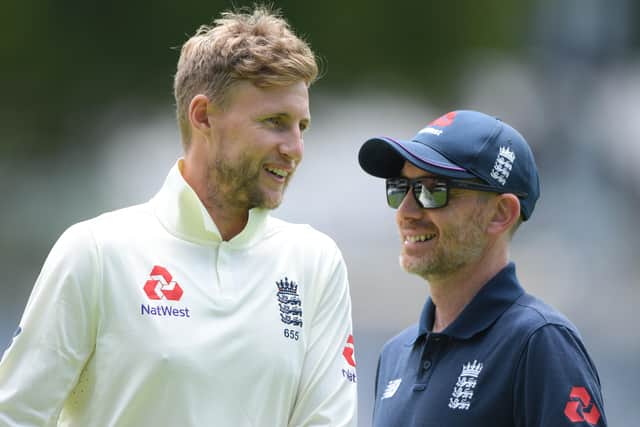 CLOSE-KNIT: Danny Reuben, right, chats to England Test captain Joe Root in Cape Town in January this year. Picture: Stu Forster/Getty Images