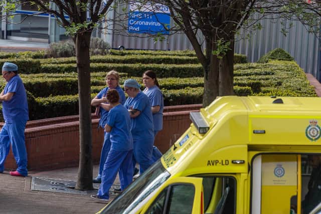 Pictured: NHS staff outside Leeds General Infirmary.