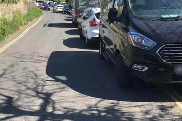 Police issues tickets to cars parked on double yellow lines