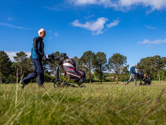 Socially distanced golfers play a round at Moortown Golf Club
