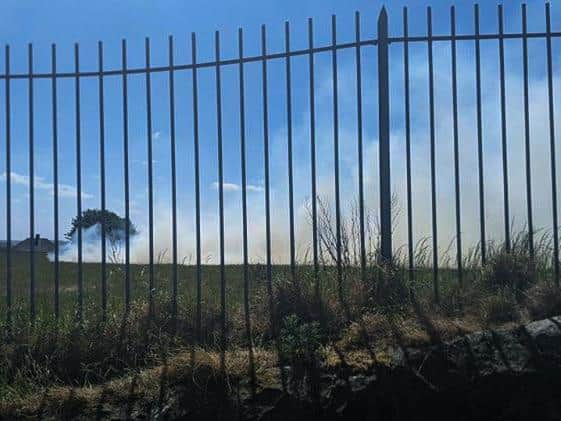 Smoke can be seen on the private grassland next to Bramley Park. Photo provided by: Gabriel Colbeck