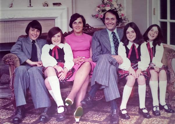 Ilana Estelle, pictured second from right, with her mum and dad, two sisters and her brother.