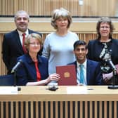 West Yorkshire's council leaders with Chancellor Rishi Sunak, and Simon Clarke, the Local Government Minister, as the area's devolution deal is signed.