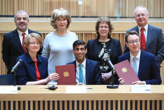 West Yorkshire's council leaders with Chancellor Rishi Sunak, and Simon Clarke, the Local Government Minister, as the area's devolution deal is signed.