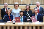 West Yorkshire's council leaders with Chancellor Rishi Sunak, and Simon Clarke, the Local Government Minister, as the area's devolution deal is signed.