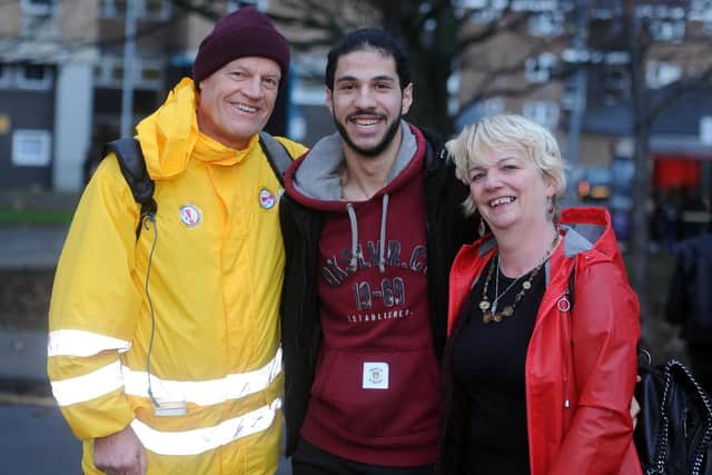 Hossein with foster carers Sally Kincaid and Steve Johnston.