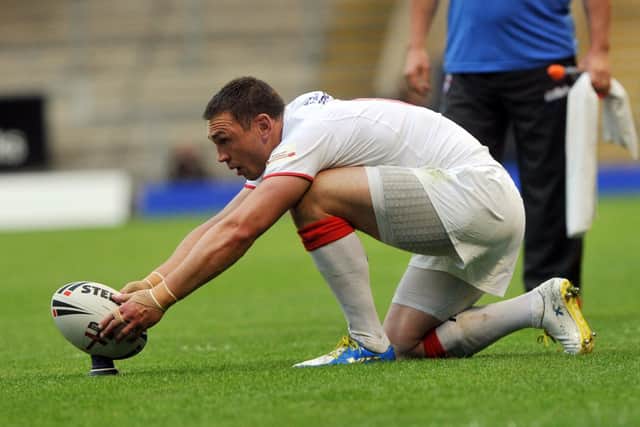 England's Kevin Sinfield in action against the Exiles at Warrington in 2013. Picture: Michelle Adamson.