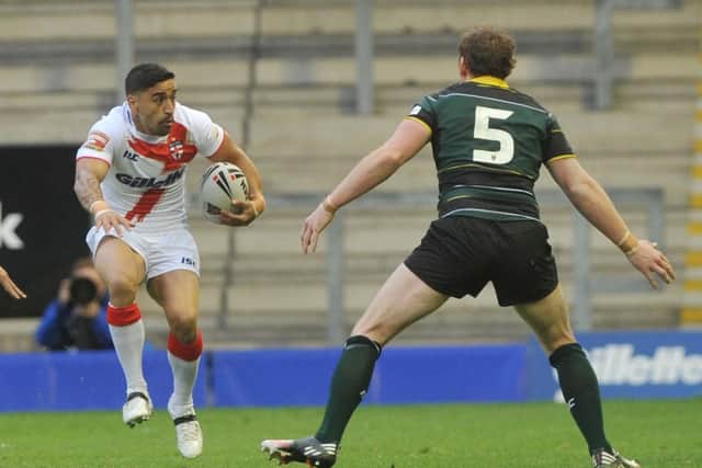 England's Rangi Chase takes evasive action against the Exiles in 2013. Picture: Michelle Adamson.