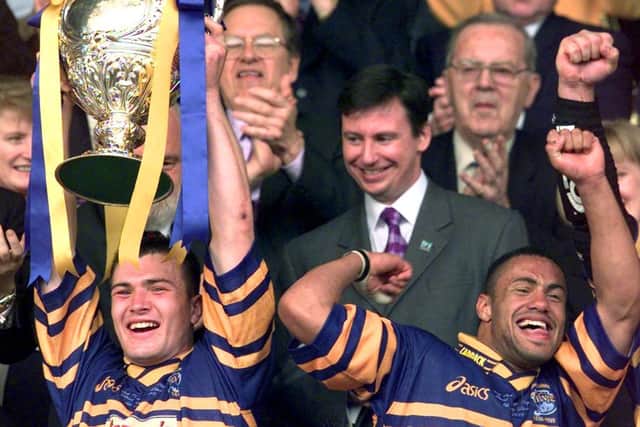 Iestyn Harris lifts the Challenge Cup at Wembley in 1999. Picture by Bruce Rollinson.