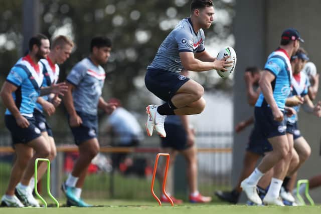 On the way back: Ryan Hall warms up during a Sydney Roosters NRL training session before the lockdown. Picture: Getty Images