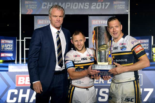 Brian McDermott with Rob Burrow and Danny McGuire after the 2017 Grand Final victory over Castleford Tigers.  Picture: Bruce Rollinson.