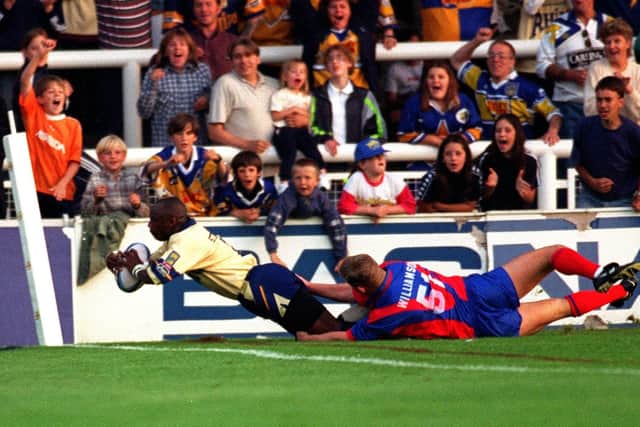 Paul Sterling scores a spectacular length-of-the-field try in Leeds Rhinos' World Club Championship victory over Adelaide Rams in 1997. Picture: Justin Lloyd.