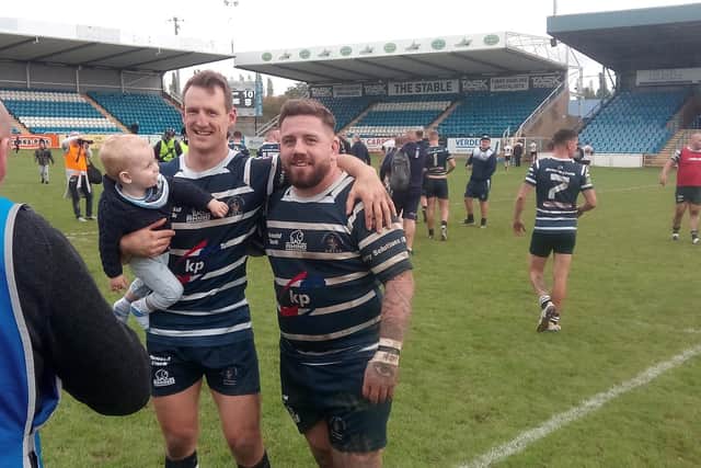 Featherstone Lions players celebrate promotion to the National Conference Premier Division.