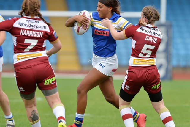 Sophie Robinson battles Wigan's defence during the 2018 Women's Super League Grand Final. Picture by Bruce Rollinson.