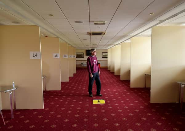 Pontefract managing director Norman Gundill in the racecourse restuarant which has been turned into a changing room for jockeys. Photo: Simon Hulme.