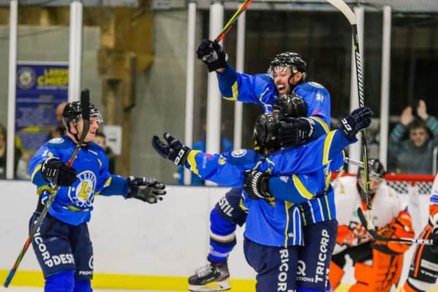 YOU BEAUTY: Leeds Chiefs' players celebrate Lewis Houston's overtime winner against Telford Tigers at Elland Road - the club's first win on home ice.
Picture courtesy of Mark Ferriss.