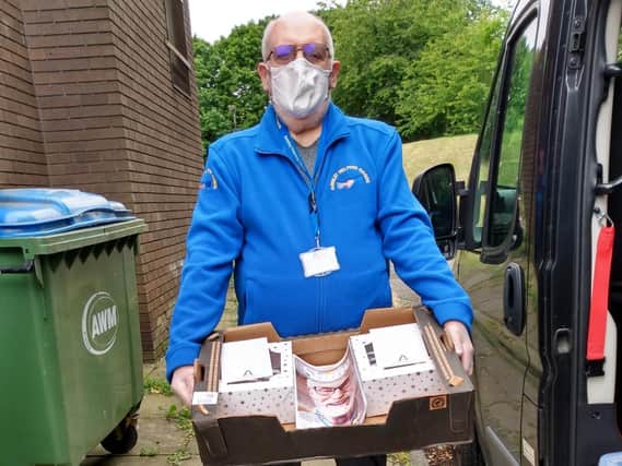 David Boutle, 83, Secretary of the trustee board of Armley Helping Hands, delivering Time to Shine's  Shine Magazine to AHH members with 'afternoon tea boxes', celebrating AHH's 25th anniversary.
