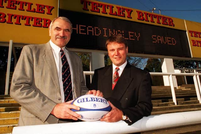 "Headingley Saved" reads the scoreboard as Paul Caddick, left and Gary Hetherington take over Leeds RLFC in November, 1996. Picture by Mark Bickerdike.