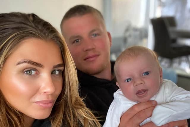 Adam Milner with partner Beth Smith and baby Laurie. Picture c/o Adam Milner.