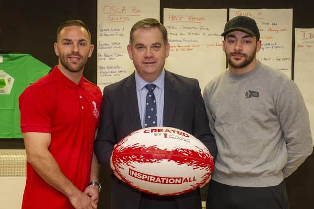 World Cup ambassadors Luke Gale and Jake Connor with Minister for Sport, Media and Creative Industries, Nigel Adams during a visit to OSCA Foundation Ltd in Halifax following £55,000 of funding from Rugby League World Cup 2021’s CreatedBy grants programme earliuer this year.  Picture: Tony Johnson.