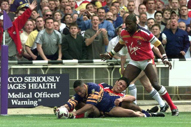 Leroy Rivett scores one of his four tries in Rhinos' 1999 Challenge Cup win over London Broncos. Picture by Bruce Rollinson.