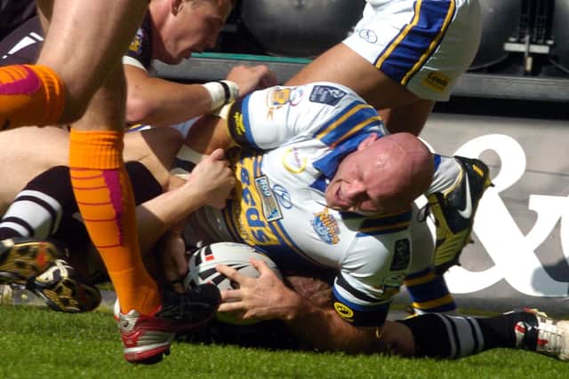 Keith Senior scores for Rhinos against Hull in his 500th career game. Picture by James Hardisty.