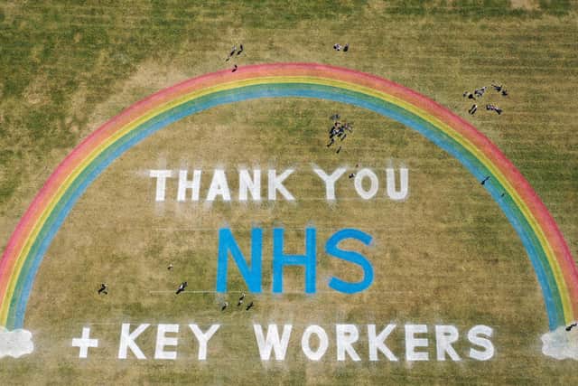 SAVIOURS: A giant rainbow mural, created by Wirral Council in New Brighton, to thank NHS and key workers during the fight against coronavirus. Photo by Christopher Furlong/Getty Images.