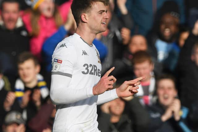GETTING THERE: Patrick Bamford celebrates scoring Leeds United's second goal in the 2-0 win at home to Huddersfield Town before lockdown but Bamford knows the Championship is an unpredictable beast. Photo by George Wood/Getty Images.