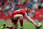 Huddersfield giants Oliver Russell lines up the ball during the Dacia Magic Weekend match of the Betfred Super League at Anfield, Liverpool. PRESS ASSOCIATION Photo. Picture date: Saturday May 25, 2019. See PA story RUGBYL Hull. Photo credit should read: Richard Sellers/PA Wire. RESTRICTIONS: Editorial use only. No commercial use. No false commercial association. No video emulation. No manipulation of images.