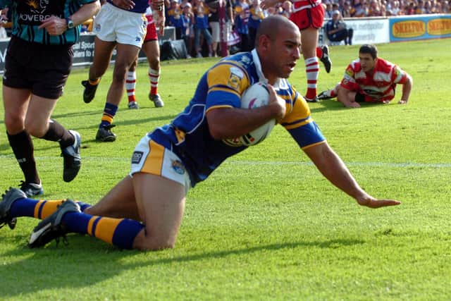 Chev Walker touches down against Wigan in 2005. Picture: Steve Riding.