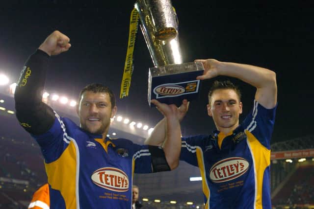 Barrie McDermott and Kevin Sinfield with the Super League trophy in 2004. Picture: Tony Johnson.