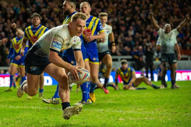 Brad Dwyer scores in Leeds' win over Warrington this season. Picture by Bruce Rollinson.