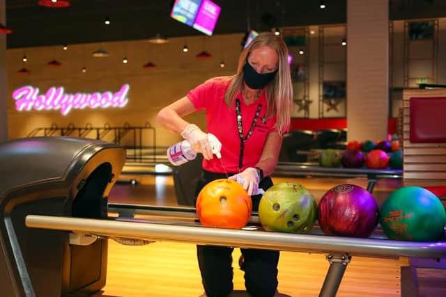 The firm said new safety measures will include enhanced cleaning after each bowling game