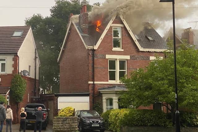 Handout photo dated 16/06/20 taken with permission from the twitter feed of James Pierce of a house on fire where more than 20 firefighters were called to after being struck by lightning in Sheffield, as violent thunderstorms swept across the north of England and Scotland, causing flash flooding in places. Photo: James Pierce/Twitter/PA Wire
