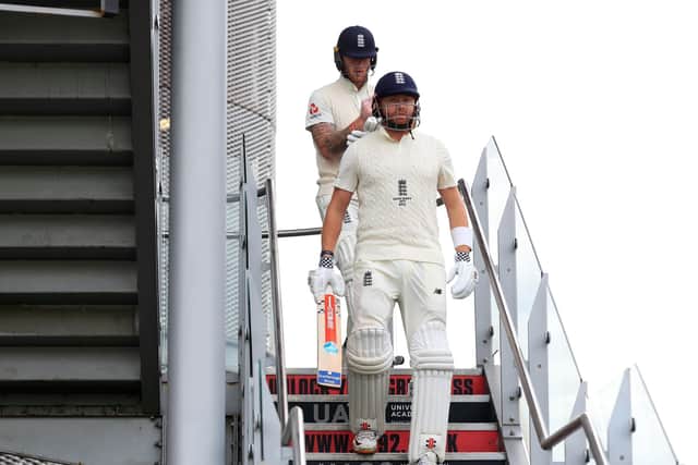 England's Jonny Bairstow (right) and Ben Stokes walk out for day four of the fourth Ashes Test at Emirates Old Trafford. Picture: Mike Egerton/PA.