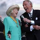 Dame Vera Lynn (centre), Petula Clark (left) and Bruce Forsyth singing "We'll Meet Again" during the World War II 60th Anniversary Service at Horse Guards Parade, London. Edmond Terakopian/PA Wire