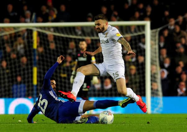 WE MEET AGAIN: : Stuart Dallas is challenged by Marlon Pack at Elland Road back in December when Leeds United let a three-goal lead slip to allow Cardiff City to gain a point. Picture: Simon Hulme