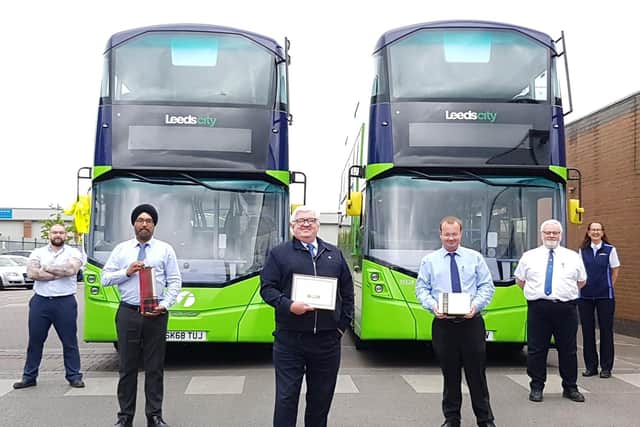Mark Jordan (centre)  flanked by (from far left Adam Johnson, depot administrator, Avtar Mudhar, staff manager and (from far right) Alyson Rowden, customer services supervisor, Tony Aimson, operations supervisor and Alistair Timmis, operations manager.